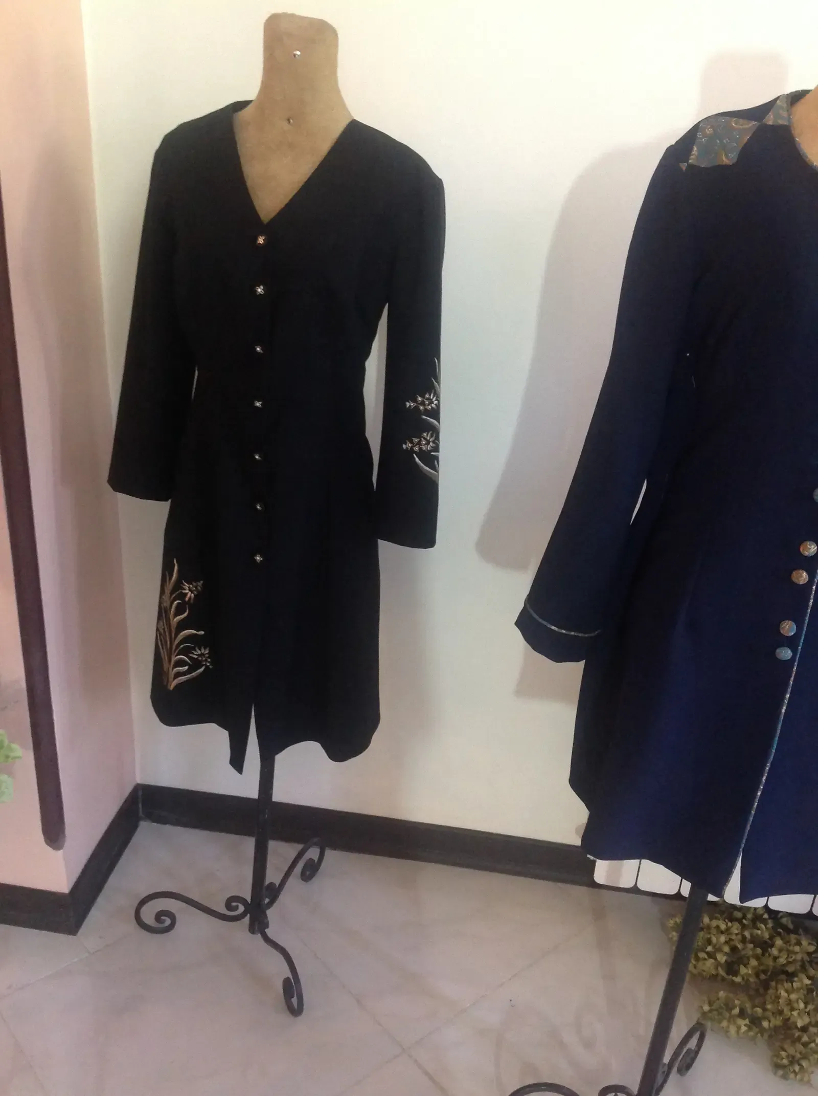 Black coat with embroidered cuff