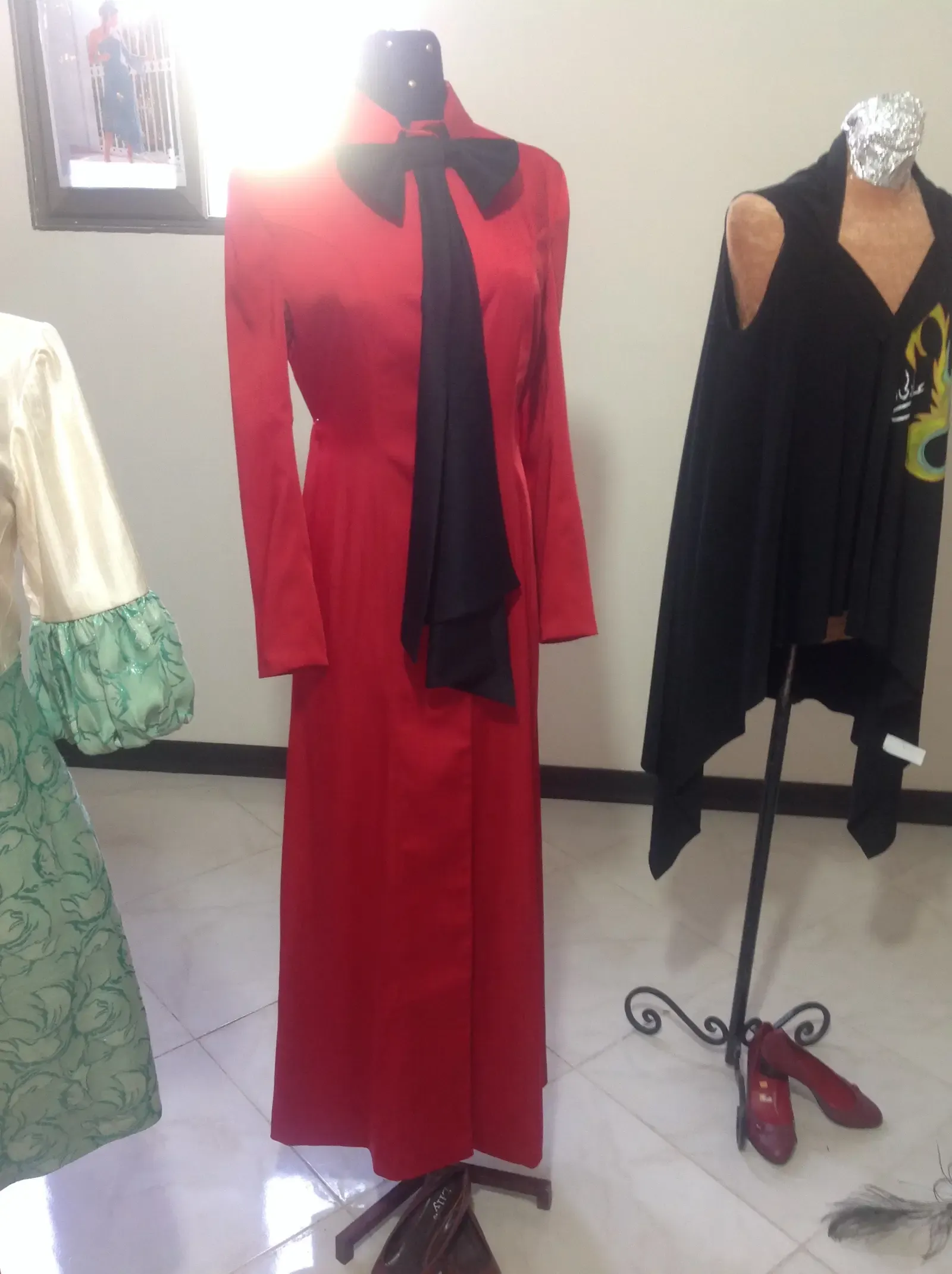 Red coat with black tie